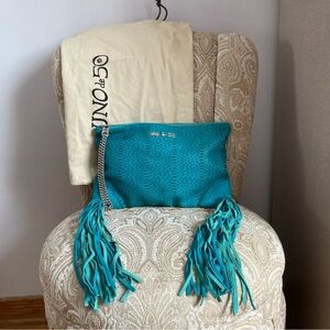 UNO de 50 | Spain Rare Teal Cut-Out Leather Fringe Wristlet Bag